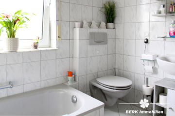 BERK Immobilien – Vermietete 4-Zimmer-Wohnung auf zwei Etagen in Sulzbach mit Garten und Terrasse - BERK Immobilien - Bad EG (114927)