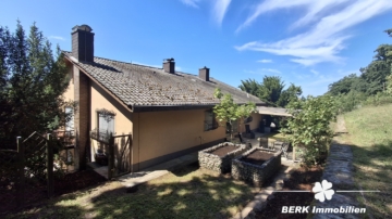 BERK Immobilien – Einfamilienhaus zum Wohlfühlen mit Panoramablick & Waldrandlage in Klingenberg/Röllfeld - Seitenansicht (116646)