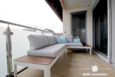 Balkon Sitzecke - BERK Immobilien – Großzügig und Hell – 5 – Zimmer Eigentumswohnung in ruhiger Lage von Stockstadt