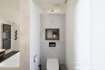 RESERVIERT – BERK Immobilien – Exklusives Design-Einfamilienhaus auf großzügigem Grundstück - Bad OG (116303)