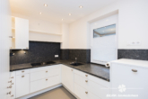 Küche - BERK Immobilien – Luxuriöse, barrierearme Eigentumswohnung mit TG-Stellplatz in zentraler Lage
