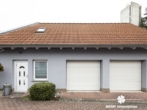 Garage - BERK Immobilien – Familienfreundliche Doppelhaushälfte mit Garten & großem Platzangebot