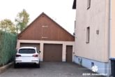 Garage - VERKAUFT – BERK Immobilien – Kapitalanlage oder Eigennutzung: Mehrfamilienhaus mit 3 Wohneinheiten in Kleinheubach