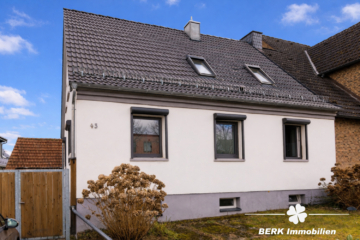 BERK Immobilien – Einfamilienhaus mit Weitblick & außergewöhnlichem Grundstück - Hausansicht (116397)