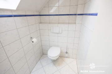 BERK Immobilien – Traumhafte 5-Zimmer Maisonette Wohnung in bevorzugter Lage von Schaafheim/ Radheim - Gäste WC (116839)