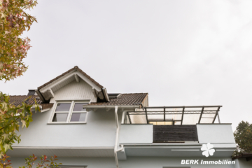 BERK Immobilien – Traumhafte 5-Zimmer Maisonette Wohnung in bevorzugter Lage von Schaafheim/ Radheim - Seitenansicht (116865)