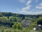 Ausblick - BERK Immobilien – Charmantes Einfamilienhaus in idyllischer Hanglage von Rothenbuch
